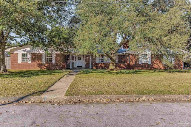 view of front of home with a front lawn