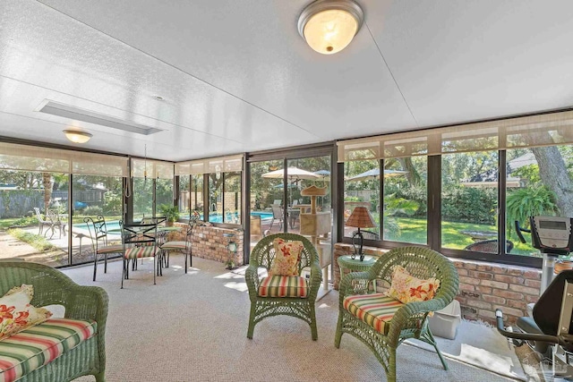 sunroom featuring a wealth of natural light