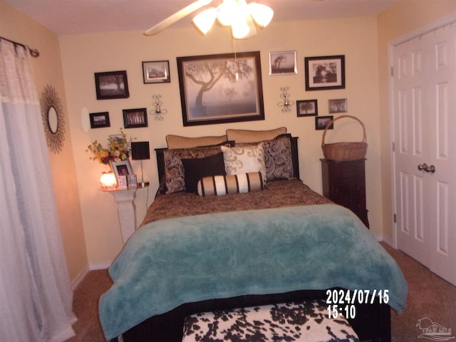 bedroom with carpet floors and baseboards