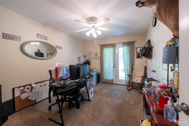 carpeted office with ceiling fan