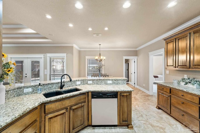 kitchen with light stone countertops, dishwasher, sink, an inviting chandelier, and crown molding