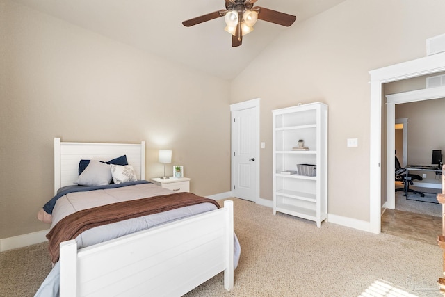 bedroom featuring ceiling fan, light carpet, and high vaulted ceiling