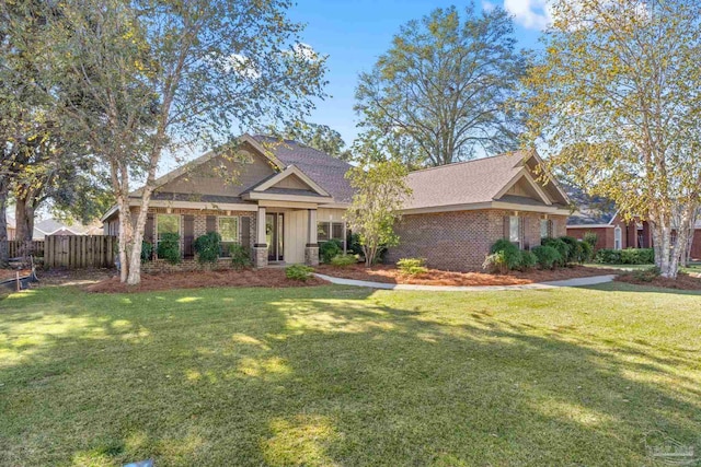 craftsman inspired home featuring a front yard