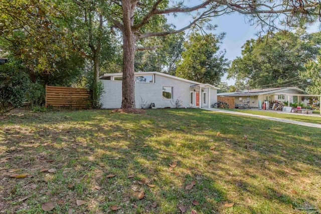 view of front of home with a front yard