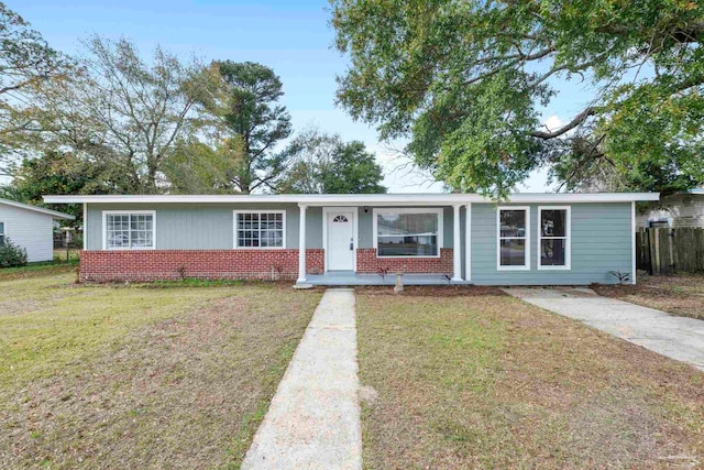 ranch-style house with a front lawn