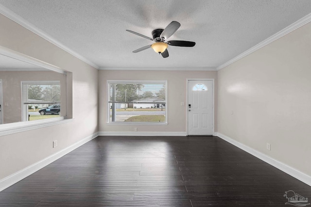 interior space featuring ceiling fan, dark hardwood / wood-style flooring, crown molding, and a textured ceiling