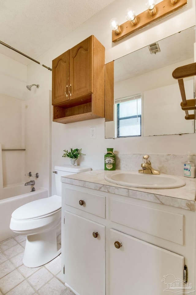 8500 Blue Jay Way, Pensacola, FL 32534 - bathroom with vanity, toilet, and tub / shower combination