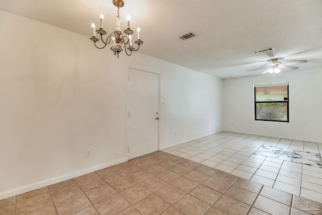 8500 Blue Jay Way, Pensacola, FL 32534 - empty room featuring a textured ceiling, a ceiling fan, light tile patterned floors, and a chandelier