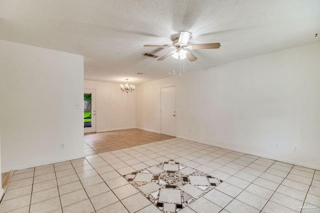 8500 Blue Jay Way, Pensacola, FL 32534 - empty room with a chandelier, a ceiling fan, a textured ceiling, and light tile patterned floors