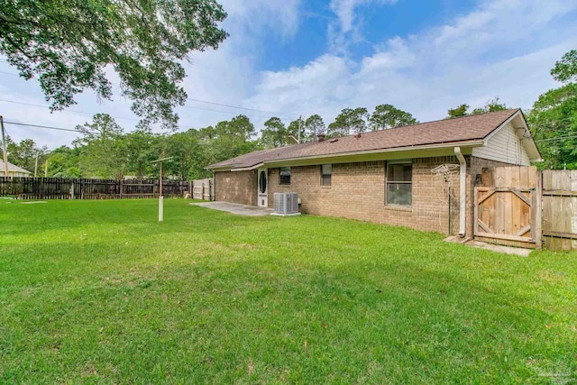 8500 Blue Jay Way, Pensacola, FL 32534 - rear view of house with central AC and brick siding