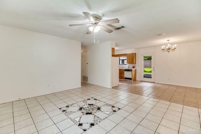 8500 Blue Jay Way, Pensacola, FL 32534 - unfurnished living room with a chandelier, ceiling fan, and light tile patterned floors