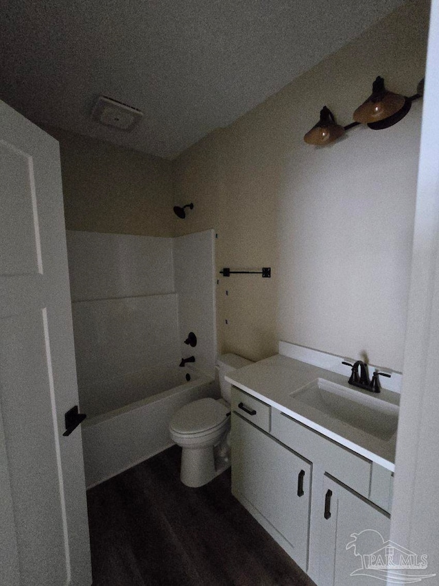 205 Webb St, Cantonment, FL 32533 - full bath with vanity, toilet, tub / shower combination, and wood finished floors