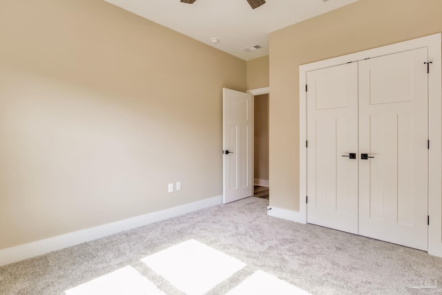 205 Webb St, Cantonment, FL 32533 - unfurnished bedroom with carpet, a closet, baseboards, and a ceiling fan