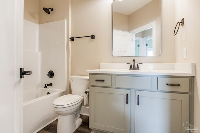 205 Webb St, Cantonment, FL 32533 - bathroom featuring toilet, vanity,  shower combination, and wood finished floors