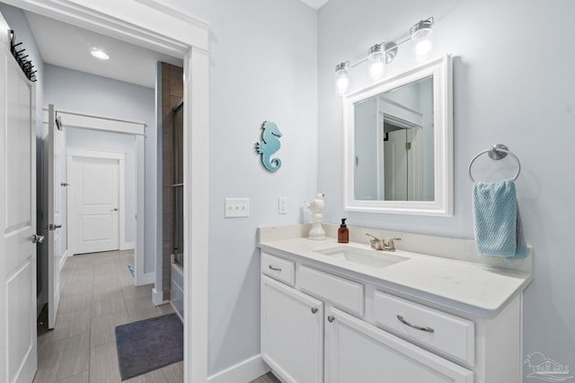 bathroom with shower / bath combination and vanity