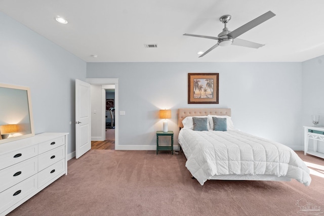 carpeted bedroom with ceiling fan