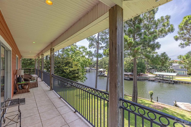 balcony featuring a water view