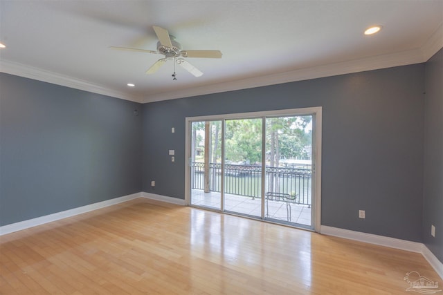 spare room with ornamental molding, ceiling fan, and light wood-type flooring