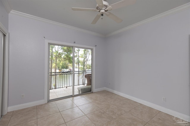 tiled empty room featuring ornamental molding and ceiling fan