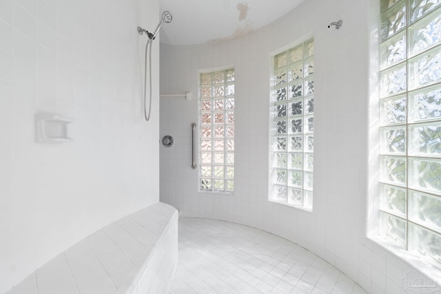 interior space with a tile shower