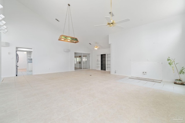 unfurnished living room with ceiling fan, light tile patterned floors, and high vaulted ceiling