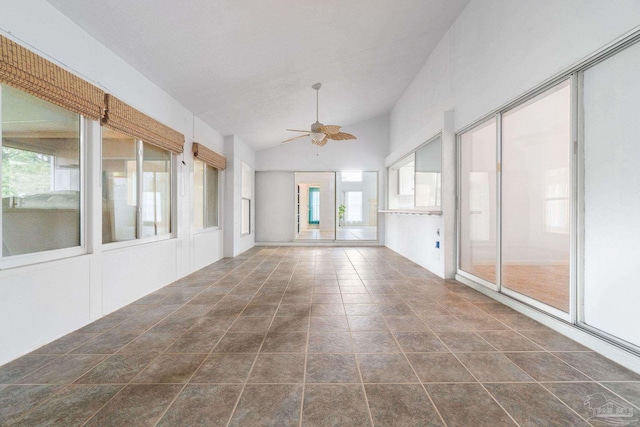 unfurnished sunroom with lofted ceiling and ceiling fan