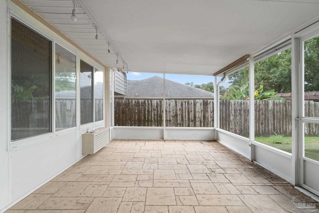 view of unfurnished sunroom