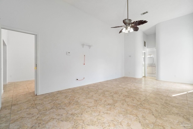 unfurnished room featuring ceiling fan and high vaulted ceiling