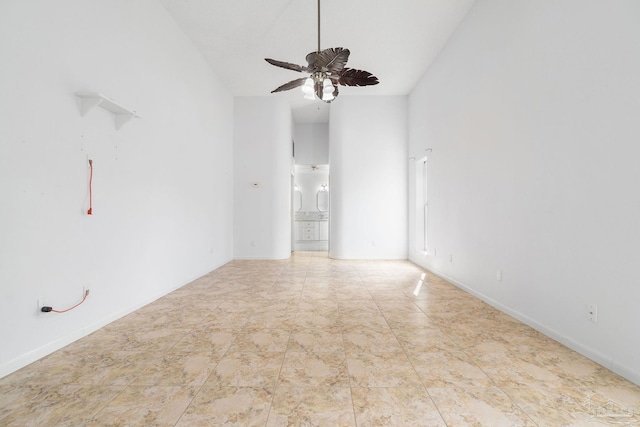 unfurnished room featuring ceiling fan