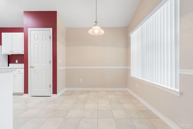 interior space featuring light tile patterned flooring