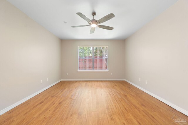 unfurnished room with ceiling fan and light hardwood / wood-style flooring