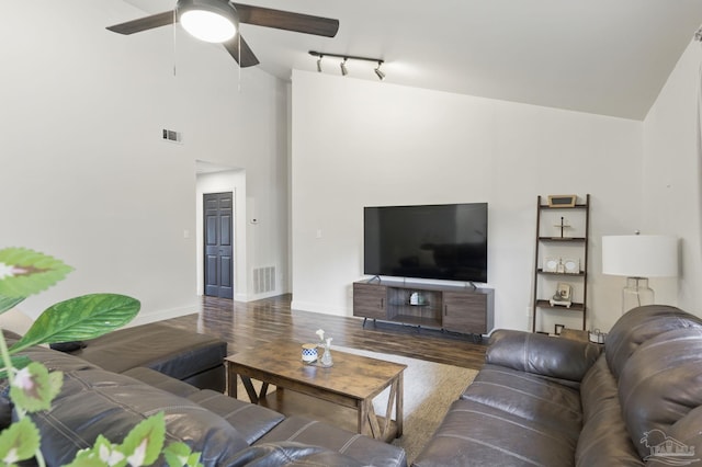 4793 Coronado Cir, Crestview, FL 32539 - living area featuring wood finished floors, ceiling fan, baseboards, track lighting, and high vaulted ceiling