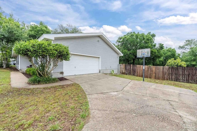 4793 Coronado Cir, Crestview, FL 32539 - view of side of home featuring fence and driveway