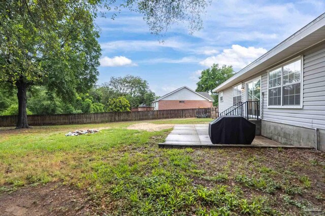 4793 Coronado Cir, Crestview, FL 32539 - view of yard featuring a patio area