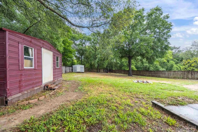 4793 Coronado Cir, Crestview, FL 32539 - view of yard featuring a storage shed and an outbuilding