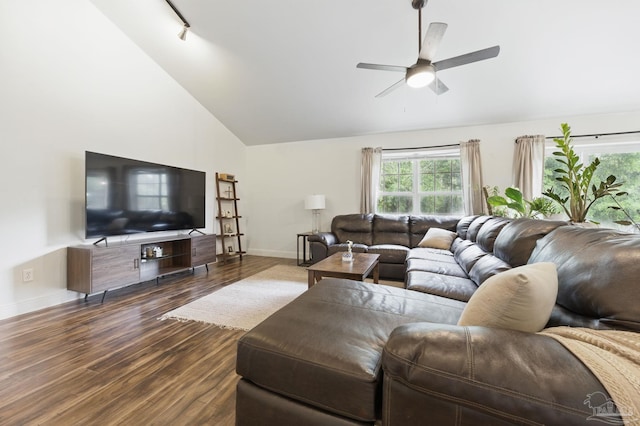4793 Coronado Cir, Crestview, FL 32539 - living area featuring dark wood-style floors, healthy amount of natural light, a ceiling fan, baseboards, and high vaulted ceiling
