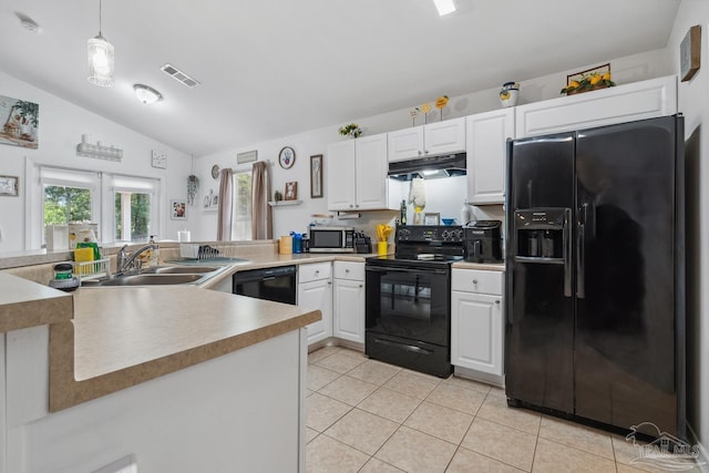 80 Woodland St, Cantonment, FL 32533 - kitchen with black appliances, a sink, under cabinet range hood, vaulted ceiling, and white cabinets