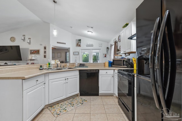 80 Woodland St, Cantonment, FL 32533 - kitchen featuring black appliances, a sink, lofted ceiling, white cabinets, and light tile patterned floors