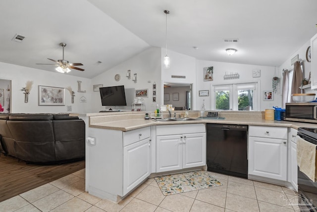 80 Woodland St, Cantonment, FL 32533 - kitchen with black appliances, a sink, vaulted ceiling, open floor plan, and light countertops