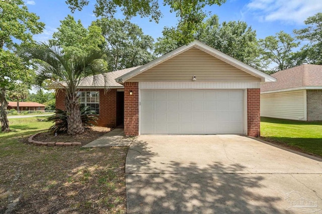 80 Woodland St, Cantonment, FL 32533 - ranch-style house featuring brick siding, driveway, an attached garage, and a front lawn