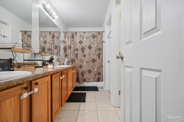 80 Woodland St, Cantonment, FL 32533 - bathroom featuring tile patterned flooring, double vanity, and curtained shower