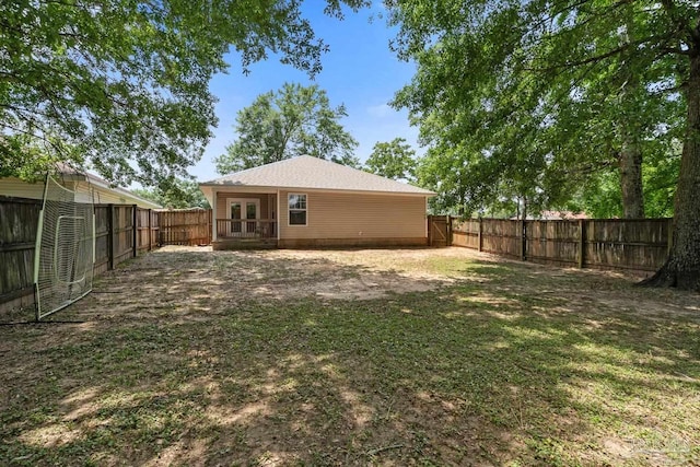 80 Woodland St, Cantonment, FL 32533 - back of property with french doors and a fenced backyard