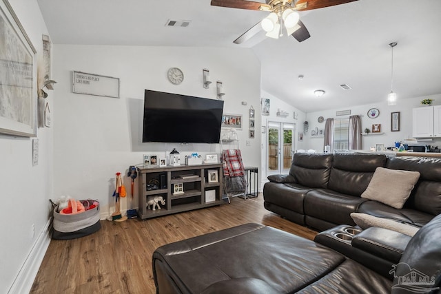 80 Woodland St, Cantonment, FL 32533 - living area featuring vaulted ceiling, ceiling fan, wood finished floors, baseboards, and french doors