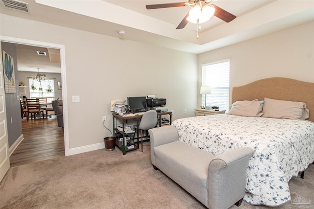 bedroom featuring wood-type flooring and ceiling fan