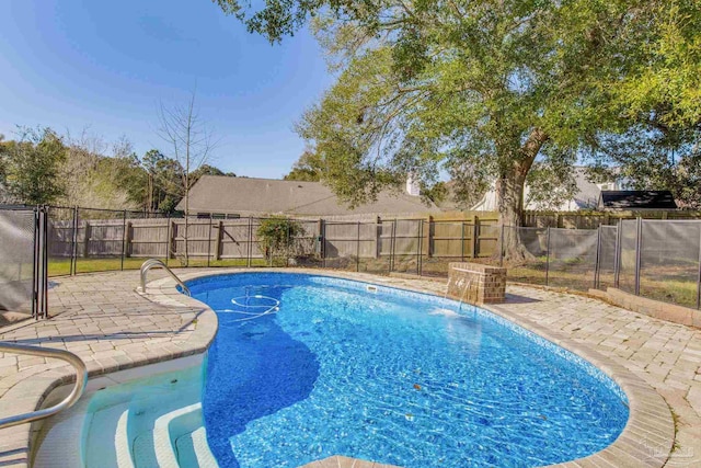 view of pool featuring a fenced in pool, a patio area, and a fenced backyard