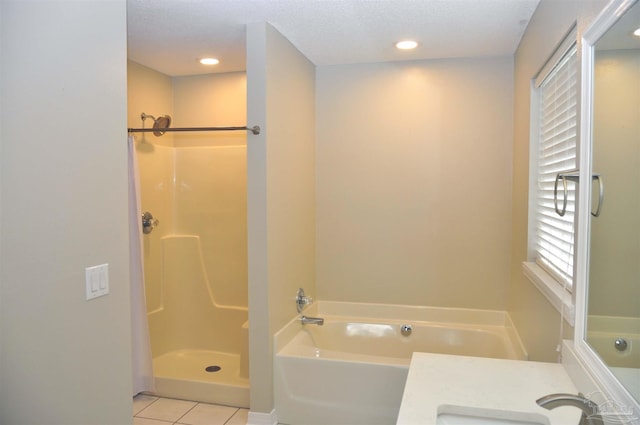 1701 Eagle Ter, Cantonment, FL 32533 - bathroom with tile patterned flooring, vanity, recessed lighting, a shower, and a bath