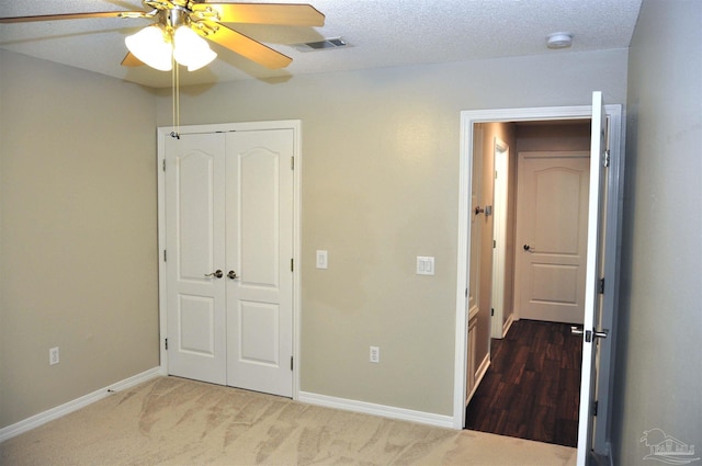 1701 Eagle Ter, Cantonment, FL 32533 - unfurnished bedroom featuring baseboards, a ceiling fan, a closet, and visible vents