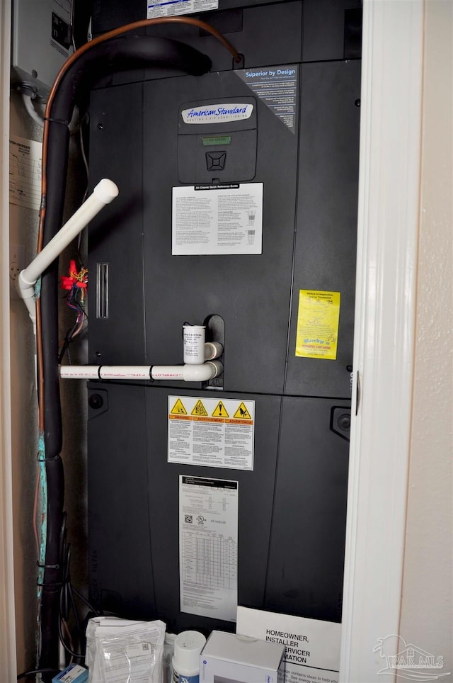 1701 Eagle Ter, Cantonment, FL 32533 - utility room featuring heating unit