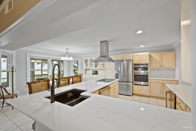 kitchen featuring island exhaust hood, stainless steel appliances, light brown cabinetry, light tile patterned floors, and sink