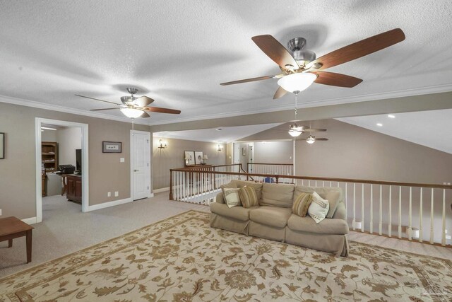 living room with ceiling fan, a textured ceiling, and light carpet